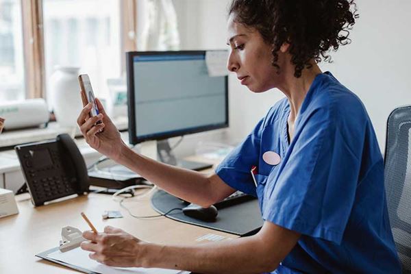 doctor asking telemedicine questions in office doctor asking telemedicine questions in office