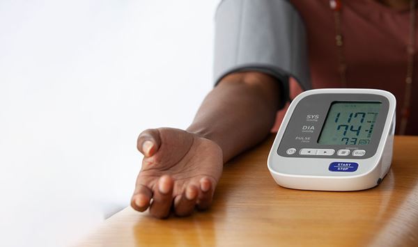 woman arm measuring blood pressure woman arm measuring blood pressure